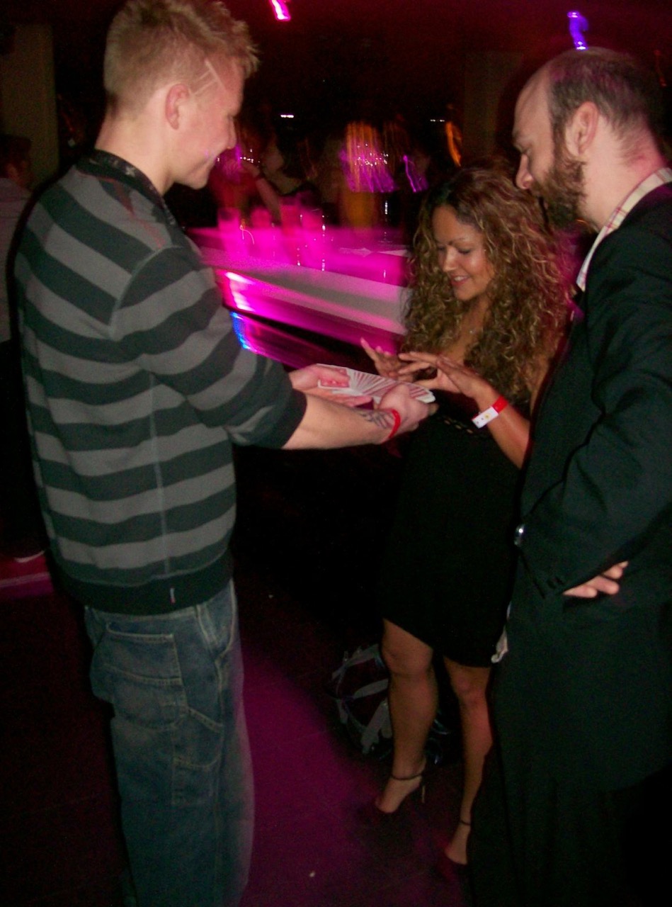 Street Magician Liam Walsh performing close up magic at MTV Party Funky Buddha Nightclub in London